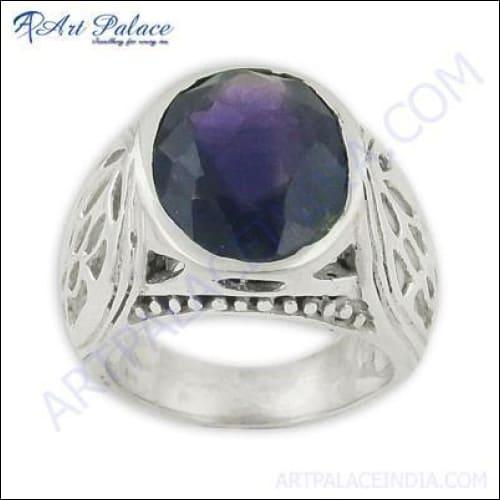 Amethyst gemstone silver ring featuring a custom fret design, showcasing its elegant craftsmanship and vibrant purple stone.