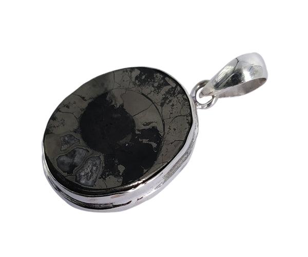 Handmade Ammonite Pyrite Silver Pendant featuring a natural ammonite gemstone with pyrite accents in a silver setting.