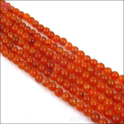 Beautiful Red Onyx Loose Beads Strands showcasing vibrant red color and smooth texture, perfect for jewelry making and healing.