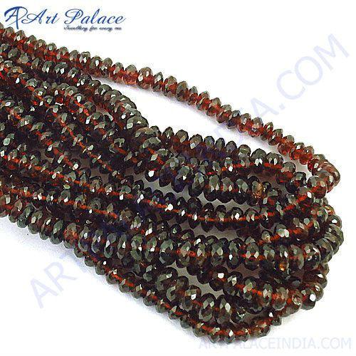 A close-up view of Best Quality Garnet Loose Beads Strands showcasing their rich deep red color and smooth surface.