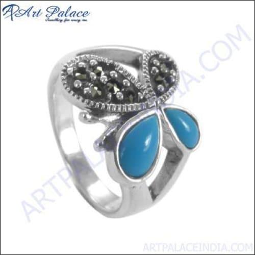 Butterfly Style Gun Metal Silver Ring featuring a vibrant synthetic turquoise gemstone, showcasing intricate design and modern finish.