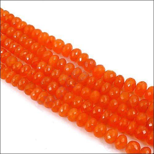 A beautiful strand of red onyx stone beads, showcasing vibrant red hues and a polished finish, perfect for jewelry making or as a fashion accessory.