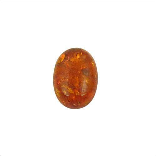 New Reddish Amber Oval 0.78 GMS Loose Gemstone showcasing a rich reddish hue, perfect for jewelry making.