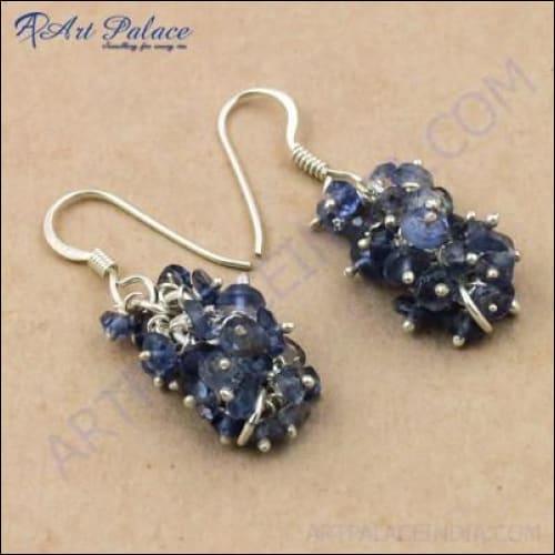 Charming silver earrings featuring beautiful iolite gemstones, showcasing elegance and craftsmanship.