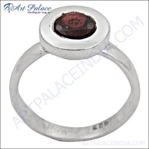 Charming Red Garnet Gemstone Silver Ring featuring a vibrant red garnet set in a sleek silver band, showcasing elegance and craftsmanship.
