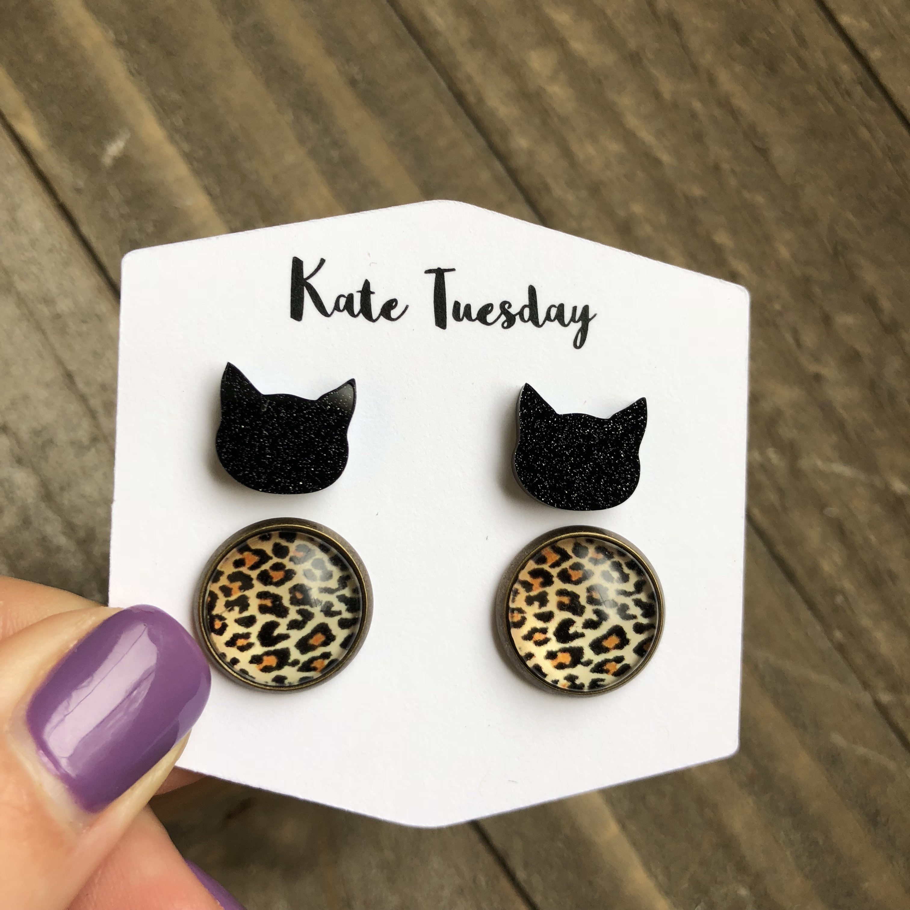 Cheetah Double Set Glittery Acrylic Cat Earrings featuring a black cat design with cheetah print accents in a bronze setting.