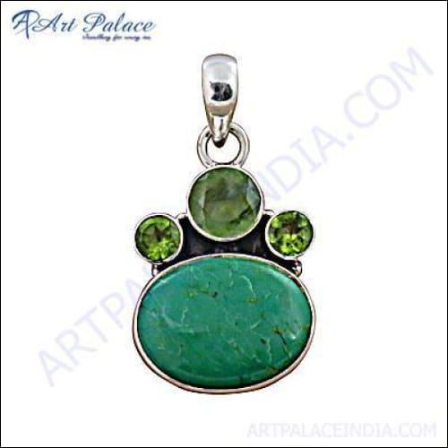 A stunning silver pendant featuring chrysoprase, peridot, and prenite gemstones, showcasing vibrant green hues and elegant craftsmanship.