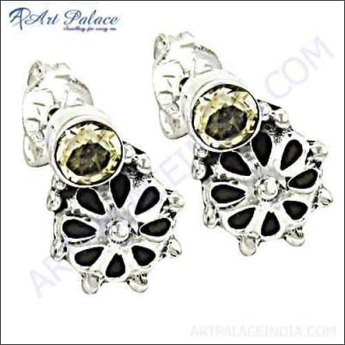 A pair of elegant Citrine Silver Earrings featuring vibrant yellow citrine gemstones set in high-quality silver, showcasing exquisite craftsmanship.