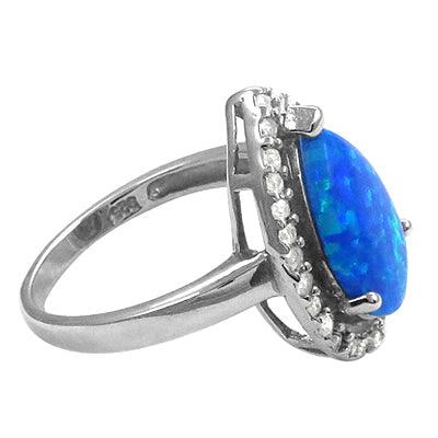 Cubic Zircon and Synthetic Turquoise Gemstone Ring in 925 Silver, showcasing intricate design and vibrant colors.