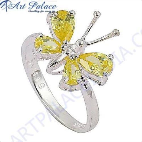 Cute butterfly style silver ring featuring yellow cubic zirconia gemstone, showcasing intricate design and craftsmanship.