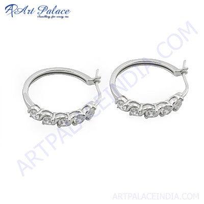 A pair of cute cubic zirconia silver earrings featuring a trendy design, sparkling stones, and a polished silver finish, perfect for any occasion.