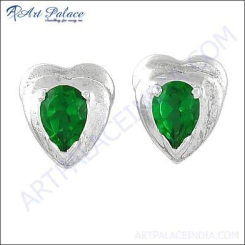Cute heart-shaped silver earrings featuring vibrant green cubic zirconia gemstones, elegantly designed for stylish wear.