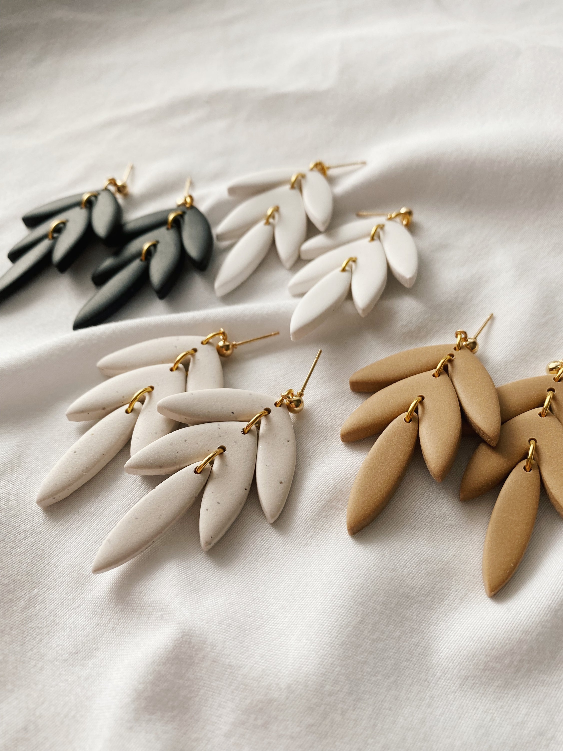 Dahlia Handmade Polymer Clay Earrings from The Timeless Collection in neutral colors, showcasing unique handcrafted design.