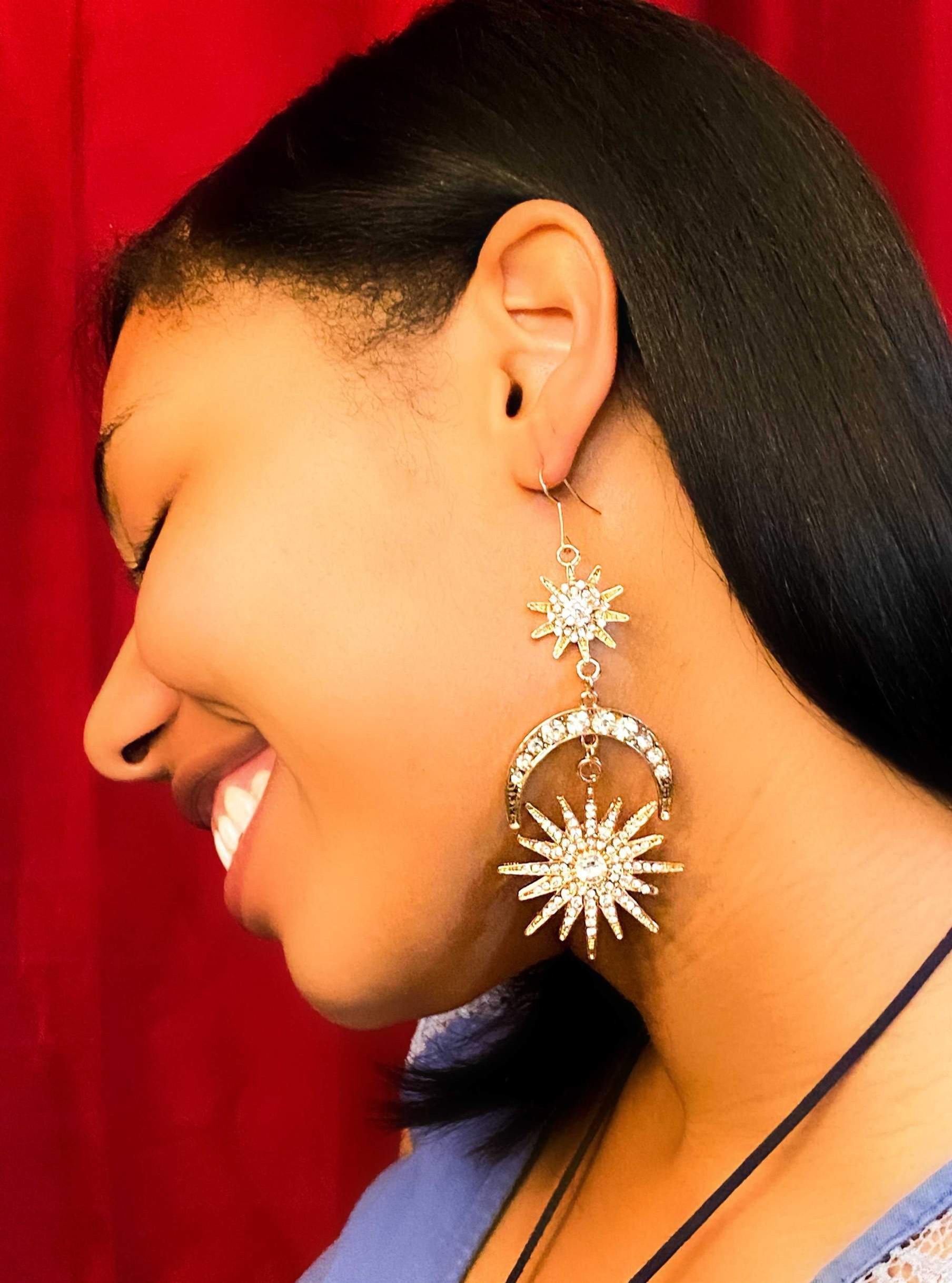 Sherea's Eclipse Earrings featuring stunning geometric drop design in gold and silver, crafted from high-quality zinc alloy.