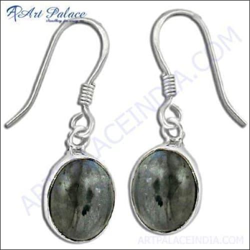 Delicate silver earrings featuring unique labradorite gemstones with shimmering hues.