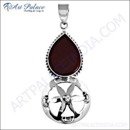 Delicate Red Onyx Silver Pendant featuring a vibrant red onyx stone set in 925 sterling silver, showcasing intricate craftsmanship.