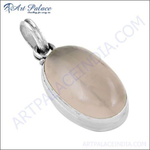 Delicate Rose Quartz Solitaire Gemstone Silver Pendant crafted from 925 sterling silver, showcasing a soft pink rose quartz stone in a minimalist design.