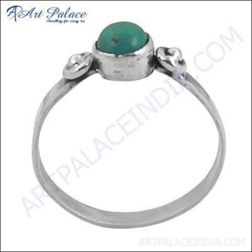 Delicate turquoise gemstone silver ring showcasing intricate design and vibrant color, perfect for elegant women's jewelry.