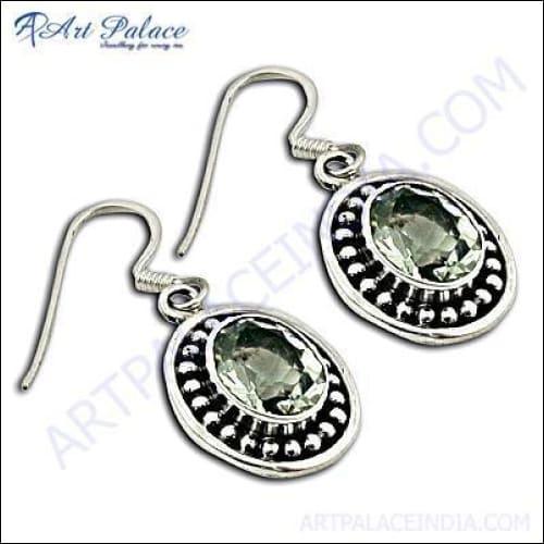 Elegant designer silver earrings featuring stunning green amethyst gemstones, showcasing a unique and stylish design.