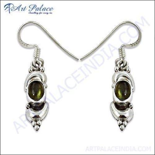 A pair of unique handmade silver earrings featuring labradorite gemstones, showcasing their iridescent colors and elegant design.