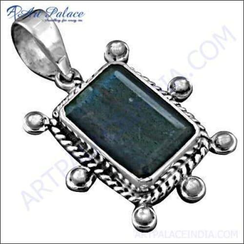 A stunning designer large labradorite gemstone silver pendant showcasing its iridescent colors and intricate silver setting.