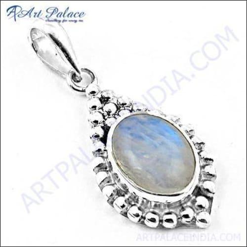 A unique handmade pendant featuring a rainbow moonstone set in 925 silver, showcasing its iridescent colors and elegant design.