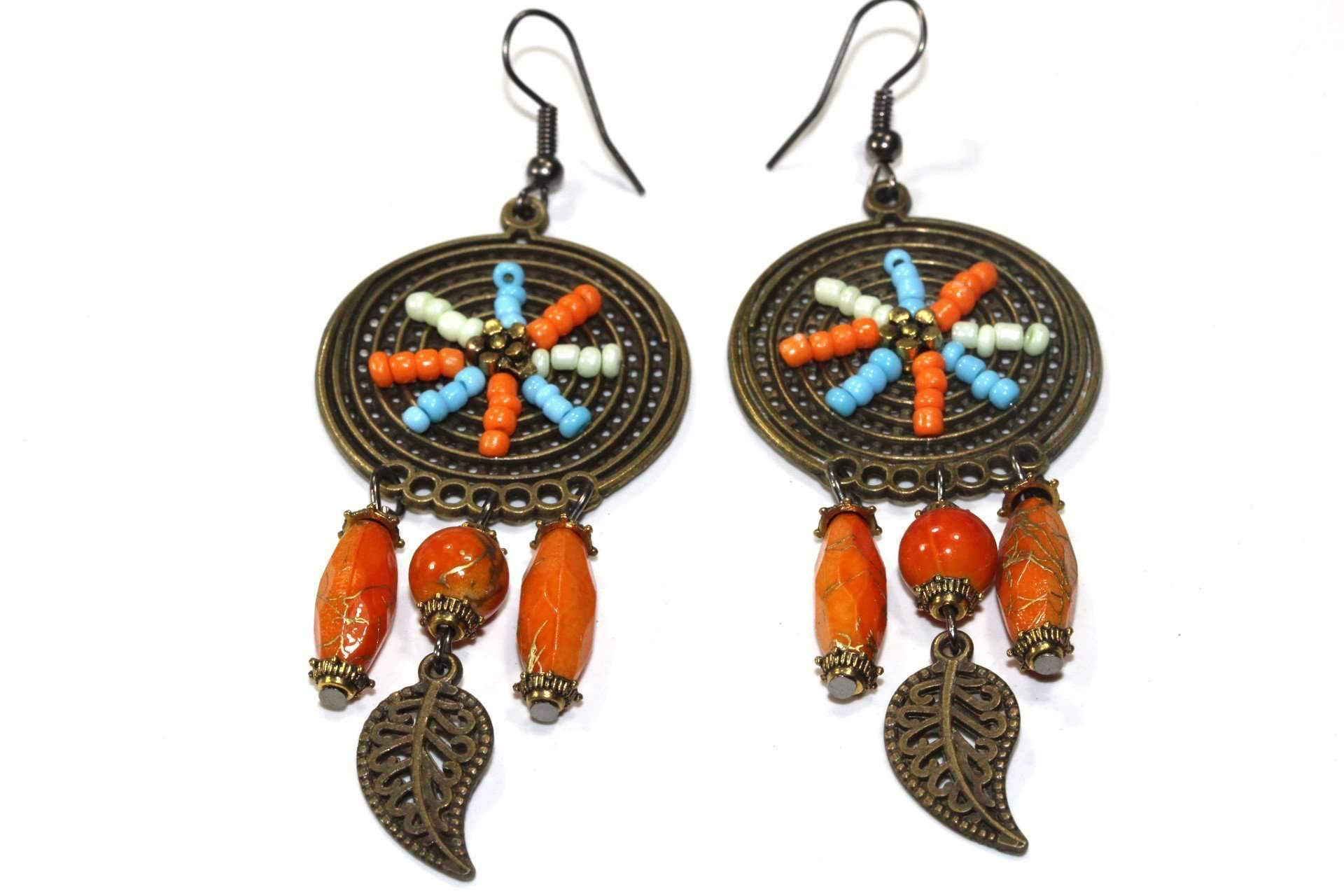 Dream Catcher Bead Work Earrings featuring bead work, leaf charms, and golden accents, showcasing a bohemian style.