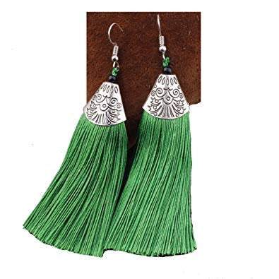 A pair of vibrant green long earrings made of high-quality thread, featuring a boho design with a metal cap.