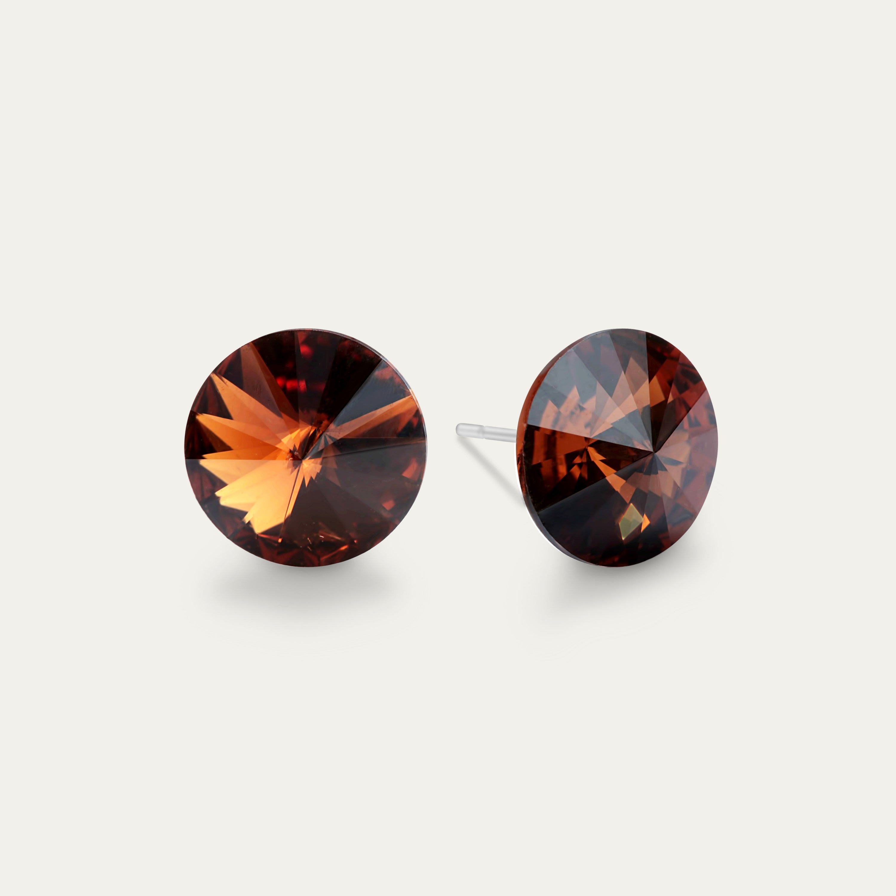 Ella Smoked Topaz 10mm Brown Color Crystal Hypoallergenic Stainless Steel Stud Earrings, showcasing a luxurious design with a sparkling rivoli cut.