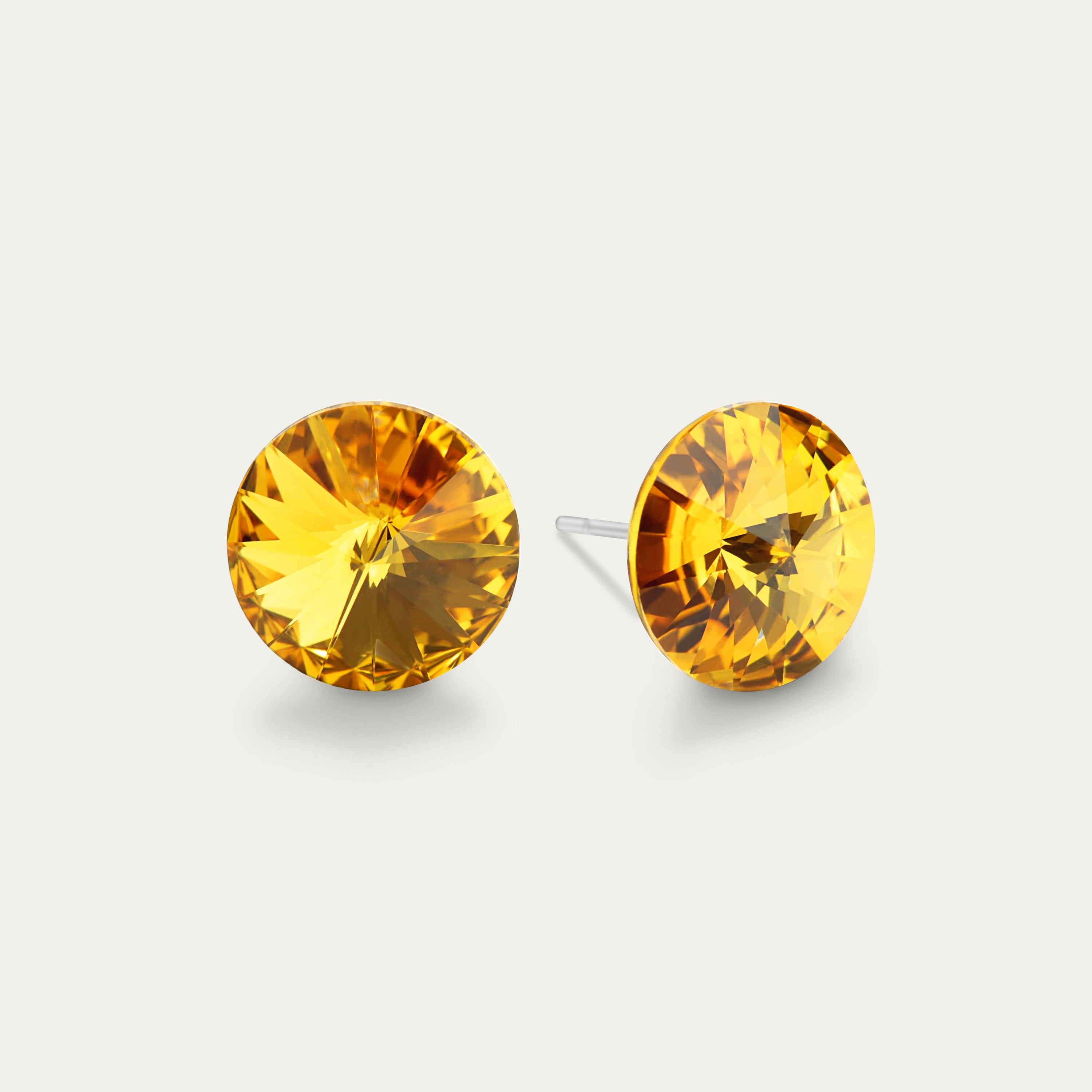 Ella - Sunflower 10mm yellow crystal earrings on a white background, showcasing their elegant design and hypoallergenic stainless steel setting.
