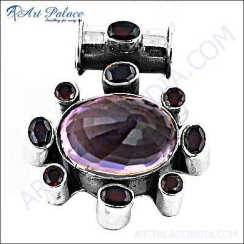 Elegant silver pendant featuring amethyst and garnet gemstones, showcasing intricate craftsmanship and stylish design.