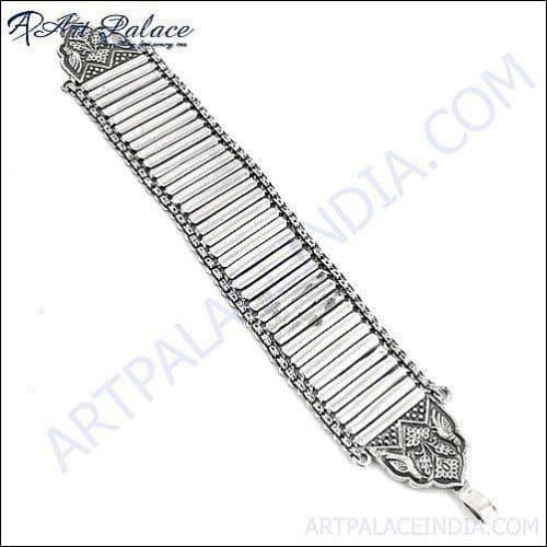 Elegant Precious Simple Silver Bracelets displayed on a soft fabric background, showcasing their exquisite craftsmanship and timeless design.