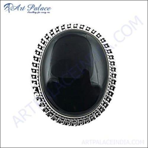 Elegant black onyx gemstone brooch set in high-quality silver, showcasing a luxurious design perfect for any occasion.