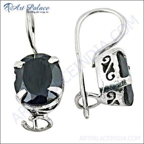 Elegant black spinel gemstone silver earrings with delicate design, showcasing their beauty and craftsmanship.