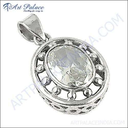 Elegant silver pendant featuring a sparkling cubic zirconia gemstone, showcasing intricate charm design.
