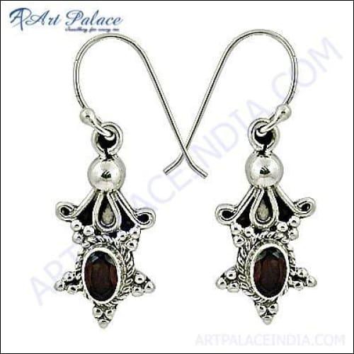 Elegant Designer Garnet Silver Earrings showcasing intricate design and vibrant garnet stones set in high-quality silver.