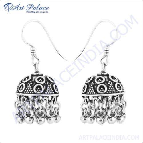 Elegant Designer Plain Silver Jhumkas showcasing intricate design and shiny finish, perfect for enhancing any outfit.
