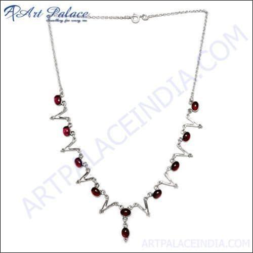 Elegant garnet and silver necklace showcasing a deep red garnet stone set in high-quality sterling silver, perfect for any occasion.