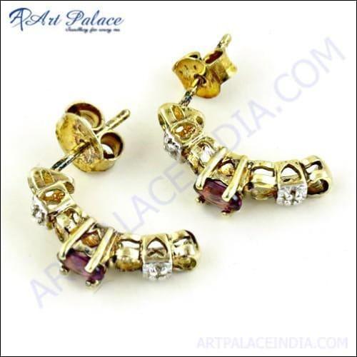 Elegant garnet cubic zirconia gemstone earrings with silver gold plating, showcasing a luxurious design.