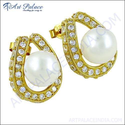 Elegant gold-plated silver earrings featuring a stunning CZ pearl gemstone, showcasing intricate design and luxurious finish.