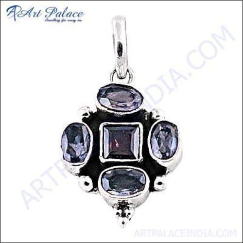 Elegant silver pendant featuring Iolite and Garnet gemstones, showcasing a stylish design perfect for any occasion.