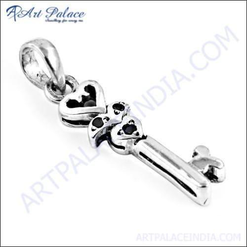 Elegant Key-Style Silver Pendant featuring a Black Onyx gemstone, showcasing intricate design and craftsmanship.