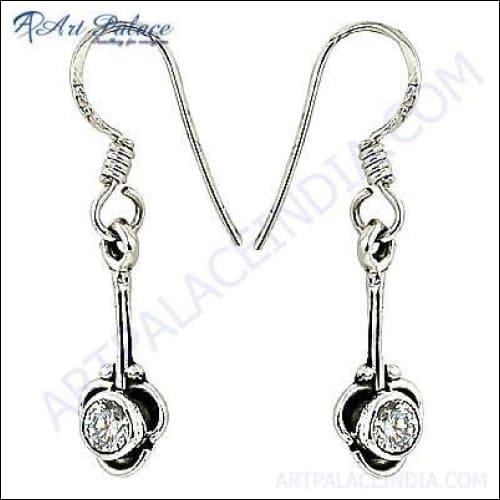 Elegant long silver earrings featuring sparkling cubic zirconia stones, showcasing a stylish and sophisticated design.