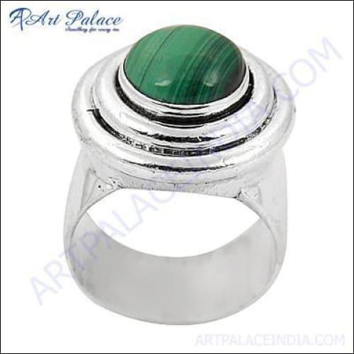 Elegant malachite gemstone silver ring showcasing intricate design and vibrant green hues.