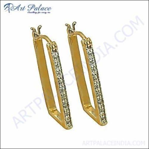 Elegant party wear jewelry featuring cubic zirconia gemstones set in silver and gold plating, showcasing intricate designs and fine craftsmanship.