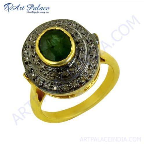 Elegant party wear designer ring featuring diamonds and emeralds set in gold-plated silver, showcasing intricate craftsmanship.
