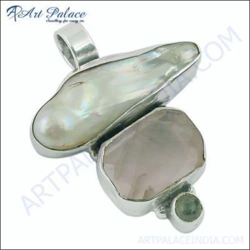 Elegant silver pendant featuring pearl, labradorite, and rose quartz gemstones, showcasing intricate craftsmanship and design.