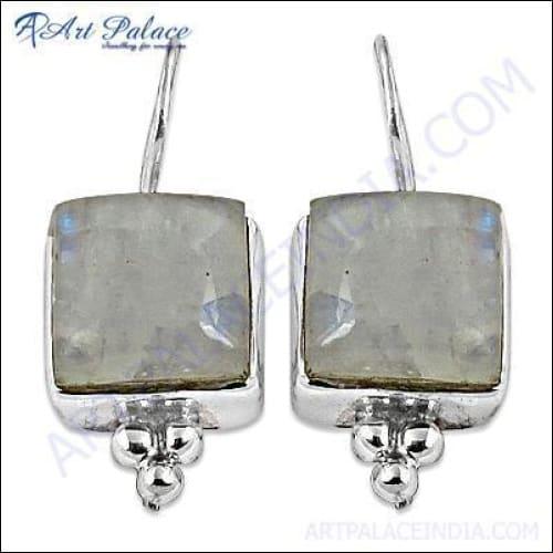 Elegant silver earrings featuring rainbow moonstone, showcasing a beautiful play of colors.