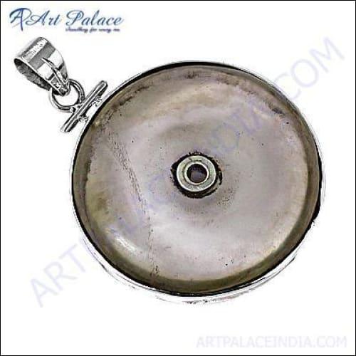 Elegant Round Silver Pendant featuring a radiant Crystal Gemstone, showcasing exquisite craftsmanship and timeless design.