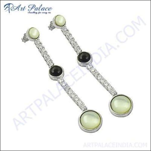 Elegant silver earrings featuring sparkling cubic zirconia, black onyx, and mother of pearl inlay, showcasing a sophisticated design.